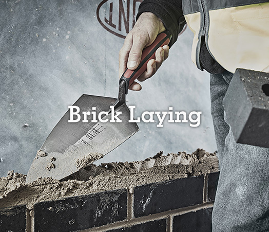 Man using bricklaying trowel banner image
